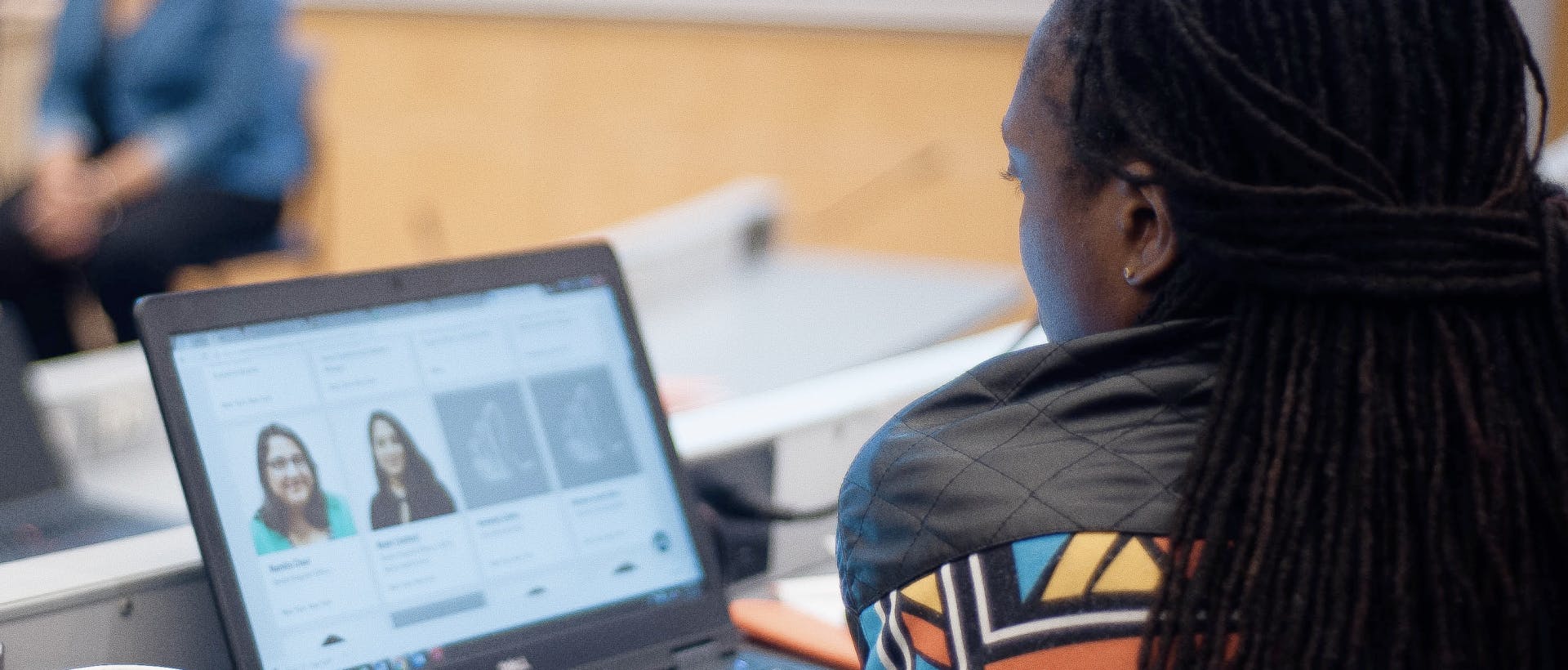 A person on a laptop looking at the Advocacy Institute application