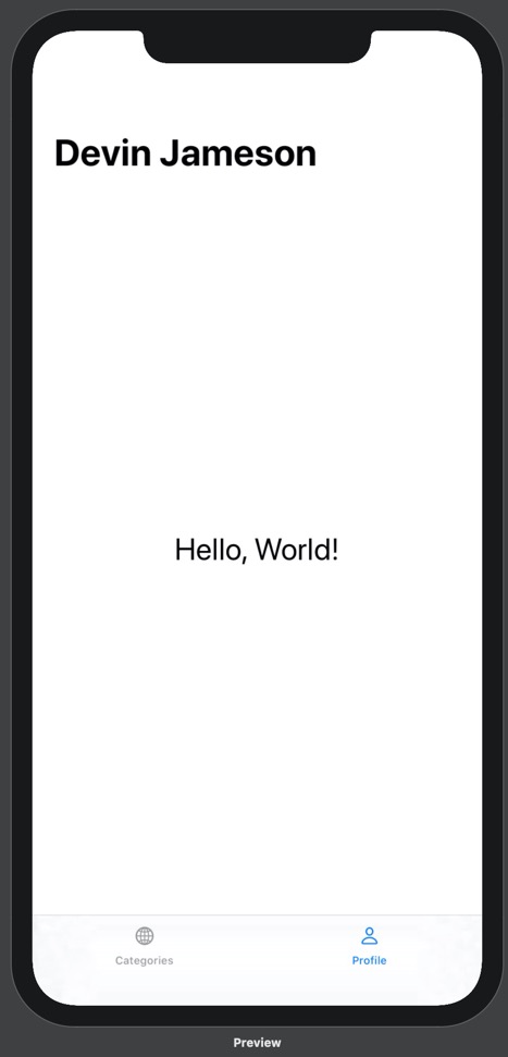 Our prototype running on iPhone 11 Pro Max. On the prototype is a bottom tab bar with two options: Categories and Profile. Above the categories tab label is a globe icon, and above the profile tab label is a person icon. The profile tab is blue and the categories tab is black. Above the bottom tab bar is the Profile view. The Profile view contains a headline with the name "Devin Jameson". Below this headline, in the middle of the screen, is the text "Hello, World!"